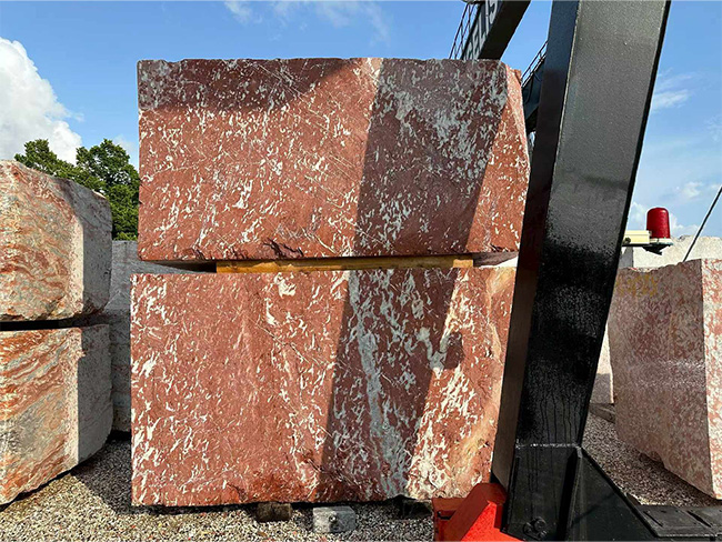 Languedoc Marble block showing natural French red stone coloration