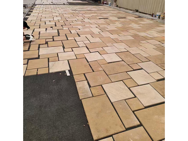 Saina Gold Limestone mixed-size paving tiles in coordinated rectangular formats