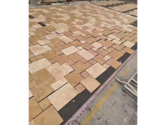 Saina Gold Limestone random pattern pavers with mixed rectangular sizes